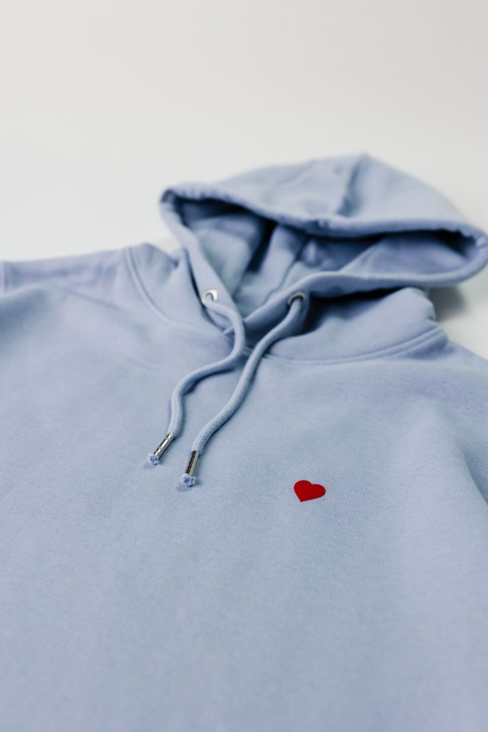 Ice blue hoodie - red heart.